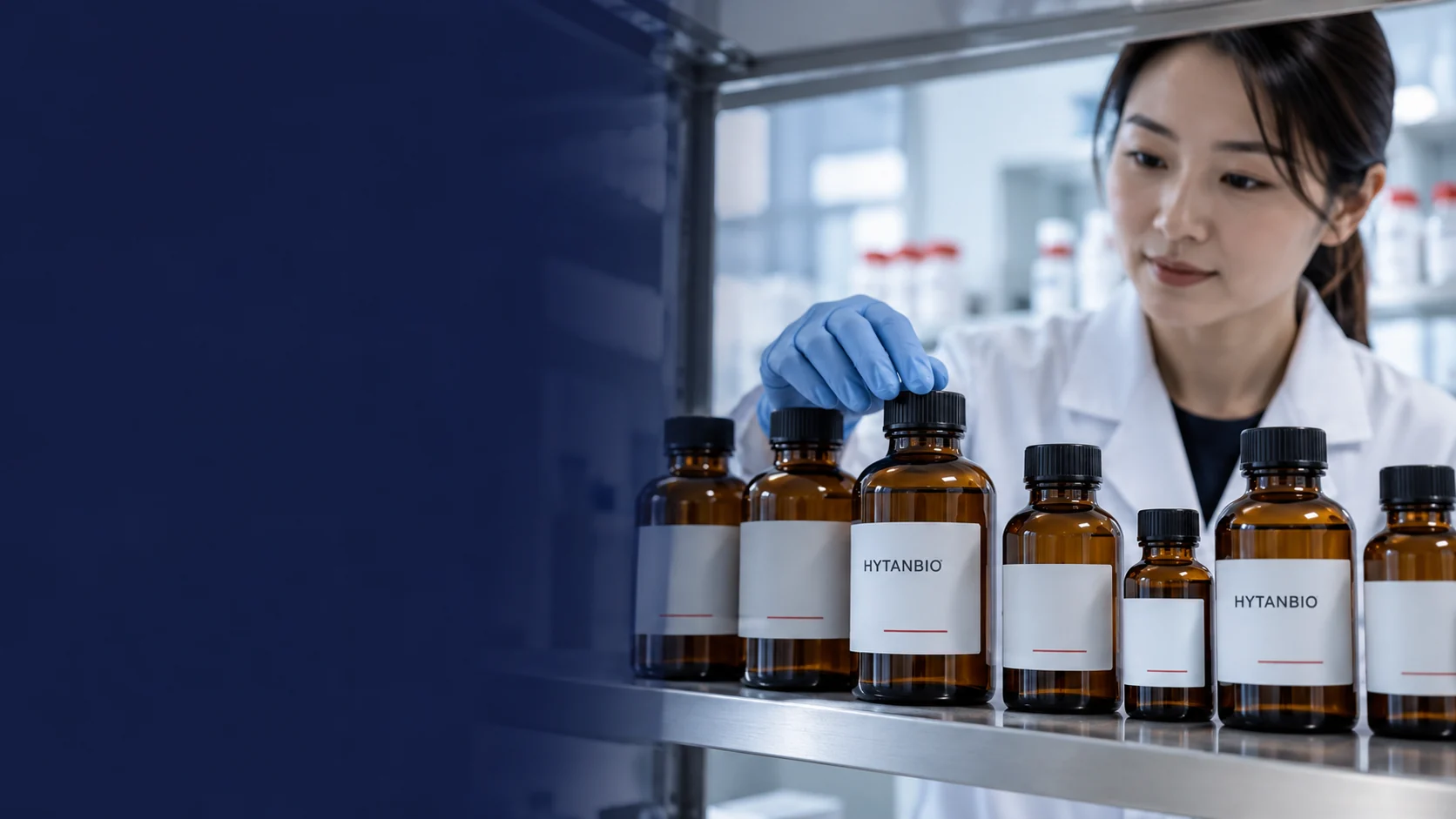 Several upright amber raw material sample bottles on a clean laboratory shelf, subtle neutral labels — illustrative development scene